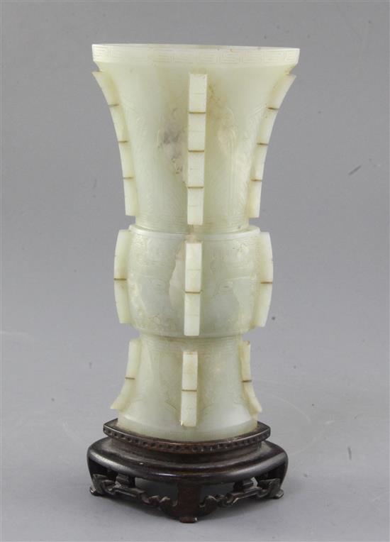 A Chinese archaistic pale celadon jade beaker vase
